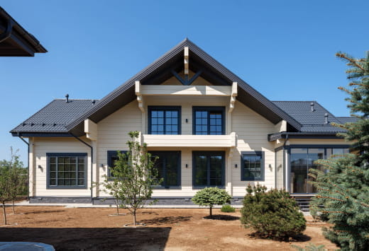 Деревянно-алюминиевые окна из лиственницы в частном доме